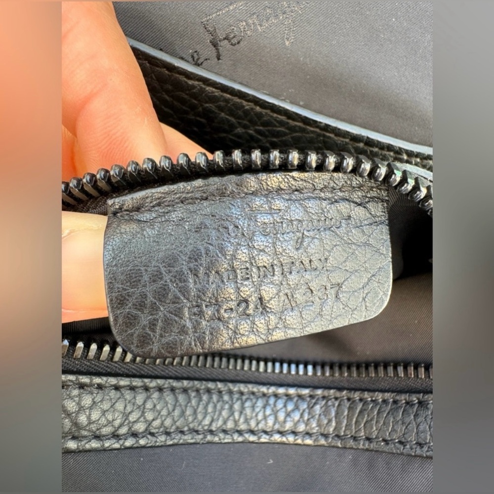 Selling my much loved Salvatore Ferragamo Black Leather Slingpack backpack